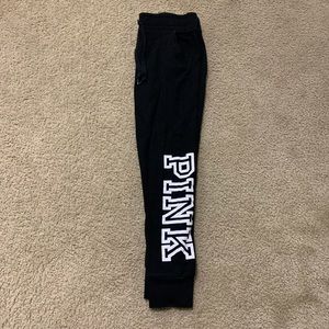 Pink size small black joggers